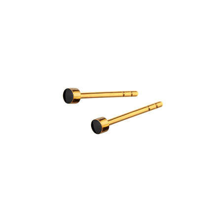 Sign Nano ear studs. Black. Gilded sterling silver. Scherning Copenhagen
